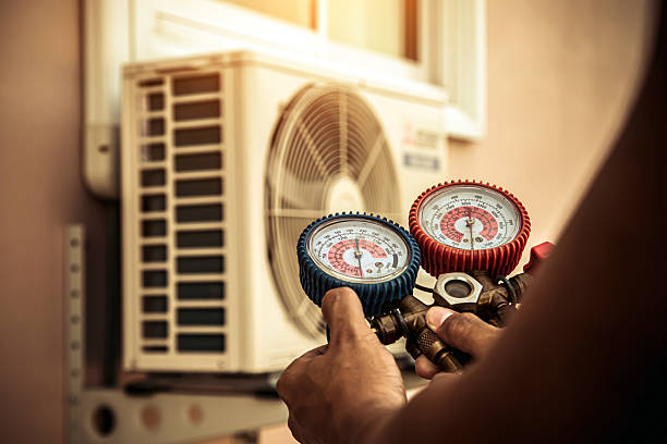 Professional Heat Pump Repair technician working in Williamstown, KY